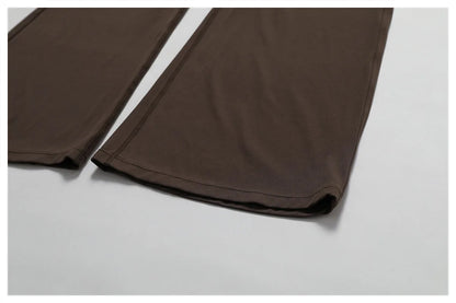 THE NOIR – OPEN BACK FLARE JUMPSUIT