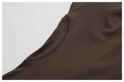 THE NOIR – OPEN BACK FLARE JUMPSUIT