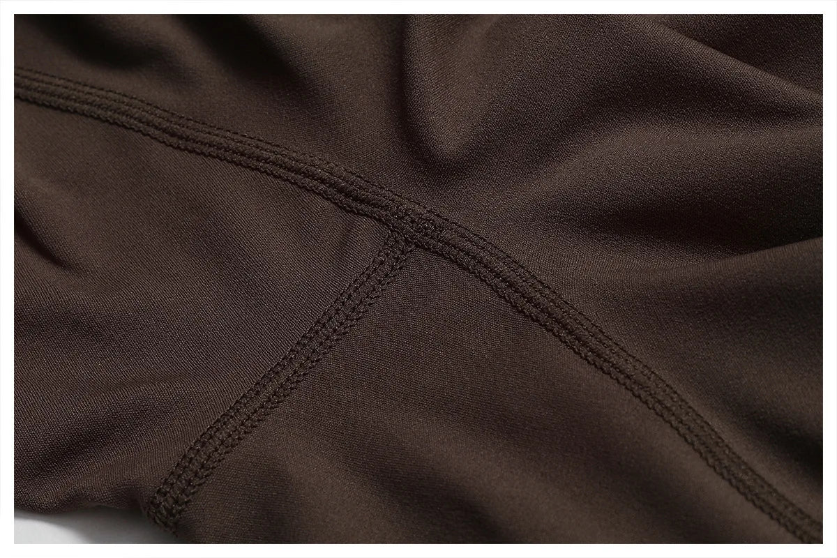 THE NOIR – OPEN BACK FLARE JUMPSUIT